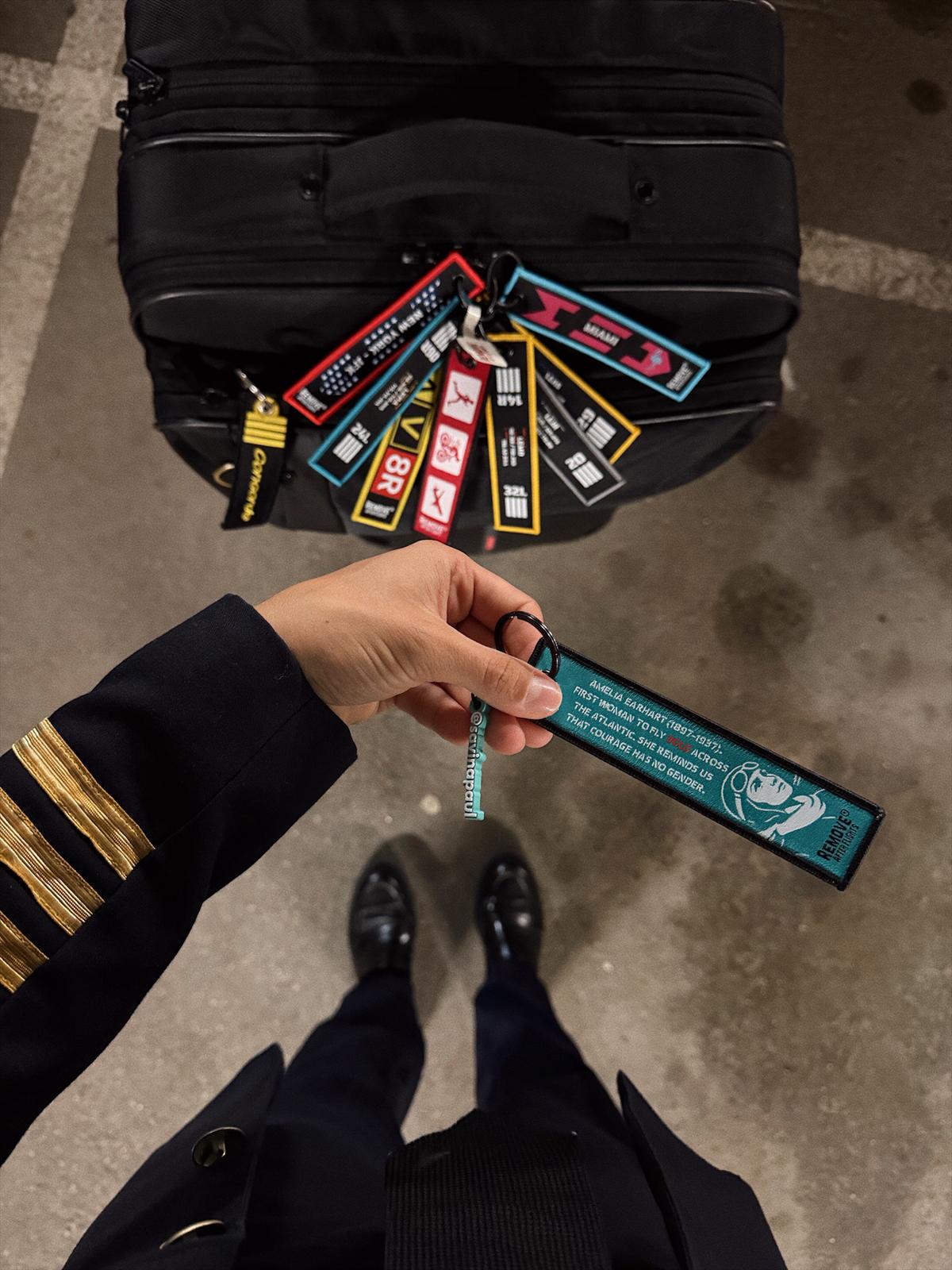 SAVINA PAUL AND HER INSPIRED AMELIA EARHART KEYCHAIN