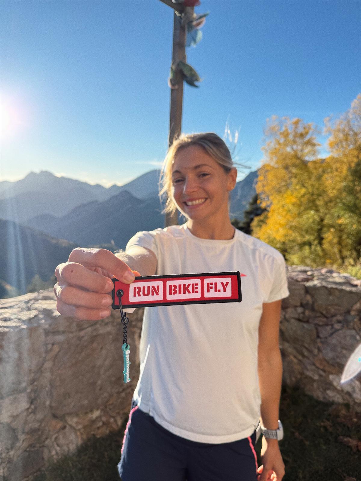 SAVINA PAUL AND HER RUN, BIKE, FLY ESPECIAL KEYCHAIN